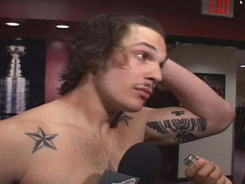 nautical star tattoos on chest. Dan Carcillo has those ugly nautical stars too. Brendan Witt