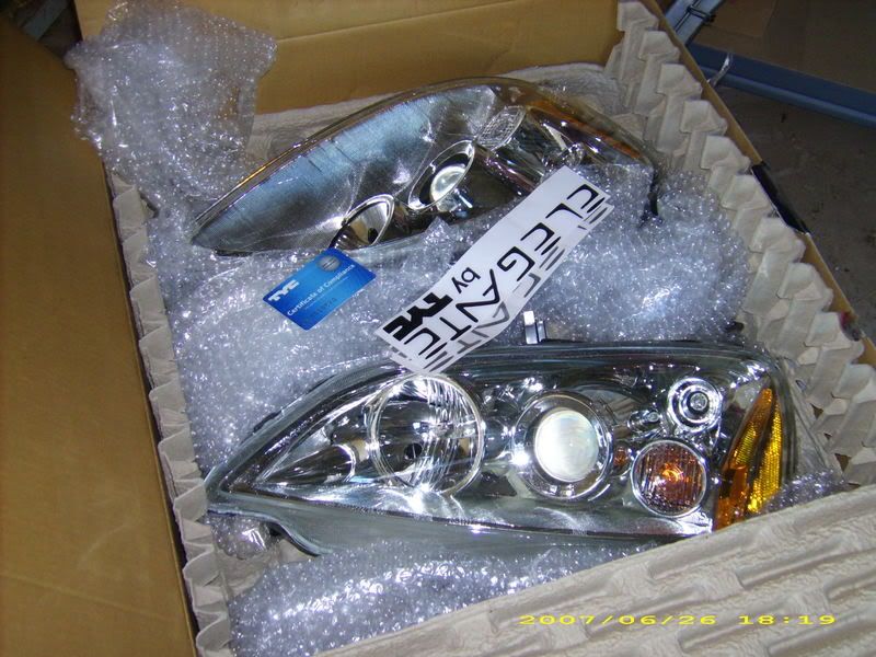 Brand new never used TYC chrome projector headlights for 0103 Civic 130